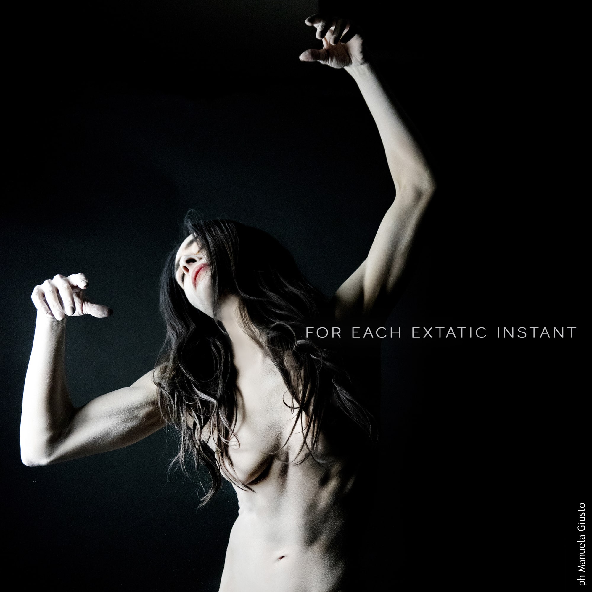 Album cover. It depicts a female nude moving through dark space.